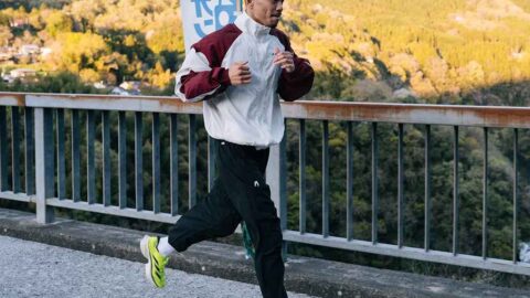 Martial artist running on the road to improve cardio and conditioning for martial arts training